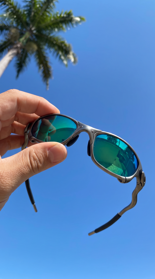 ALLOY metal sunglasses with green mirror lenses against the sky